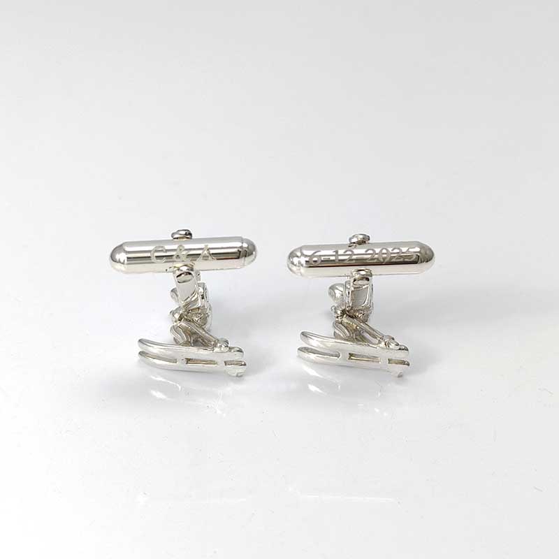 Gemelos-plata-esquiador grabado