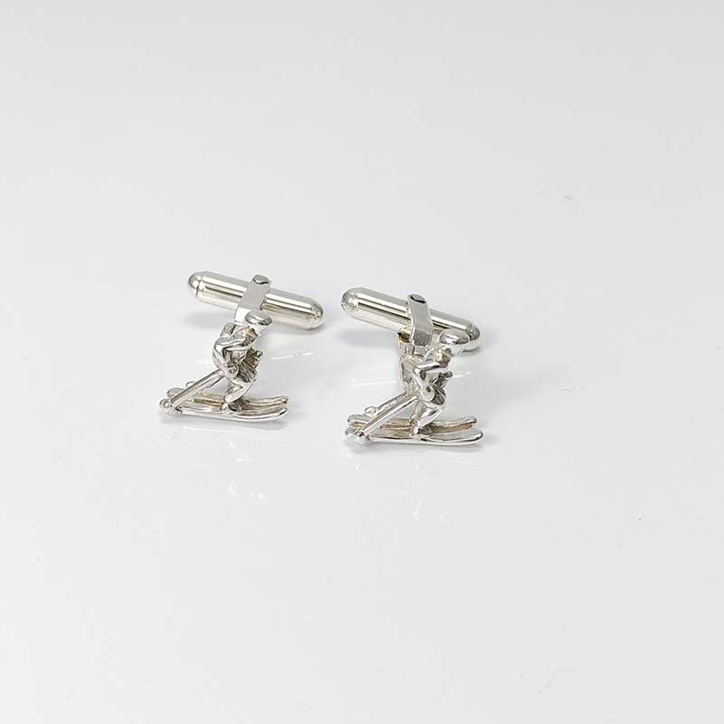 Gemelos-plata-esquiador